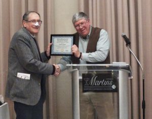 Charles August Receives Award