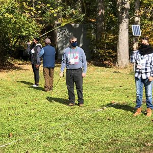 4 people practicing casting