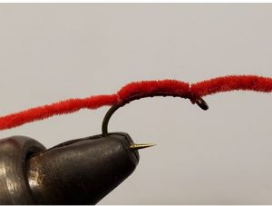 Red chenille San Juan worm fly