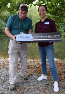 Noel Gollehon presents Ping Jiang with a new flyrod